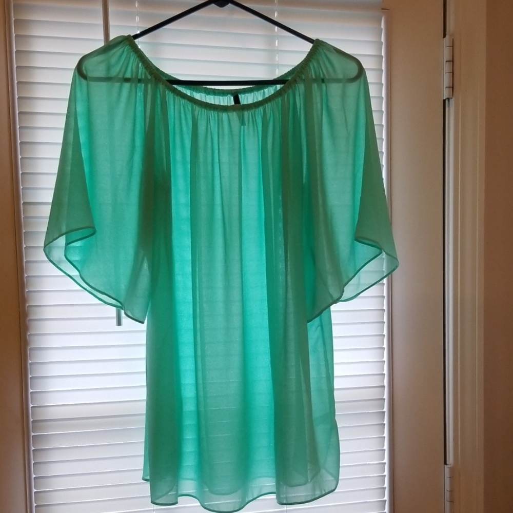 Sheer, seafoam green shirt
